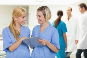 nurses discussing a nursing diagnosis