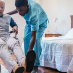 A skilled nursing facility is displayed, demonstrating a nurse assisting a patient with daily activities.