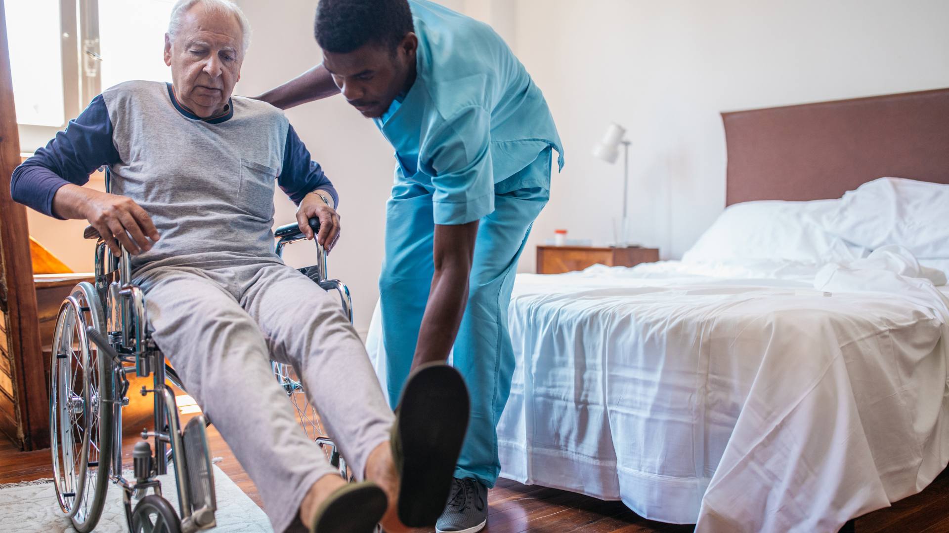 A skilled nursing facility is displayed, demonstrating a nurse assisting a patient with daily activities.