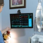 A nurse is monitoring vitals of a patient, demonstrating the LPN role.