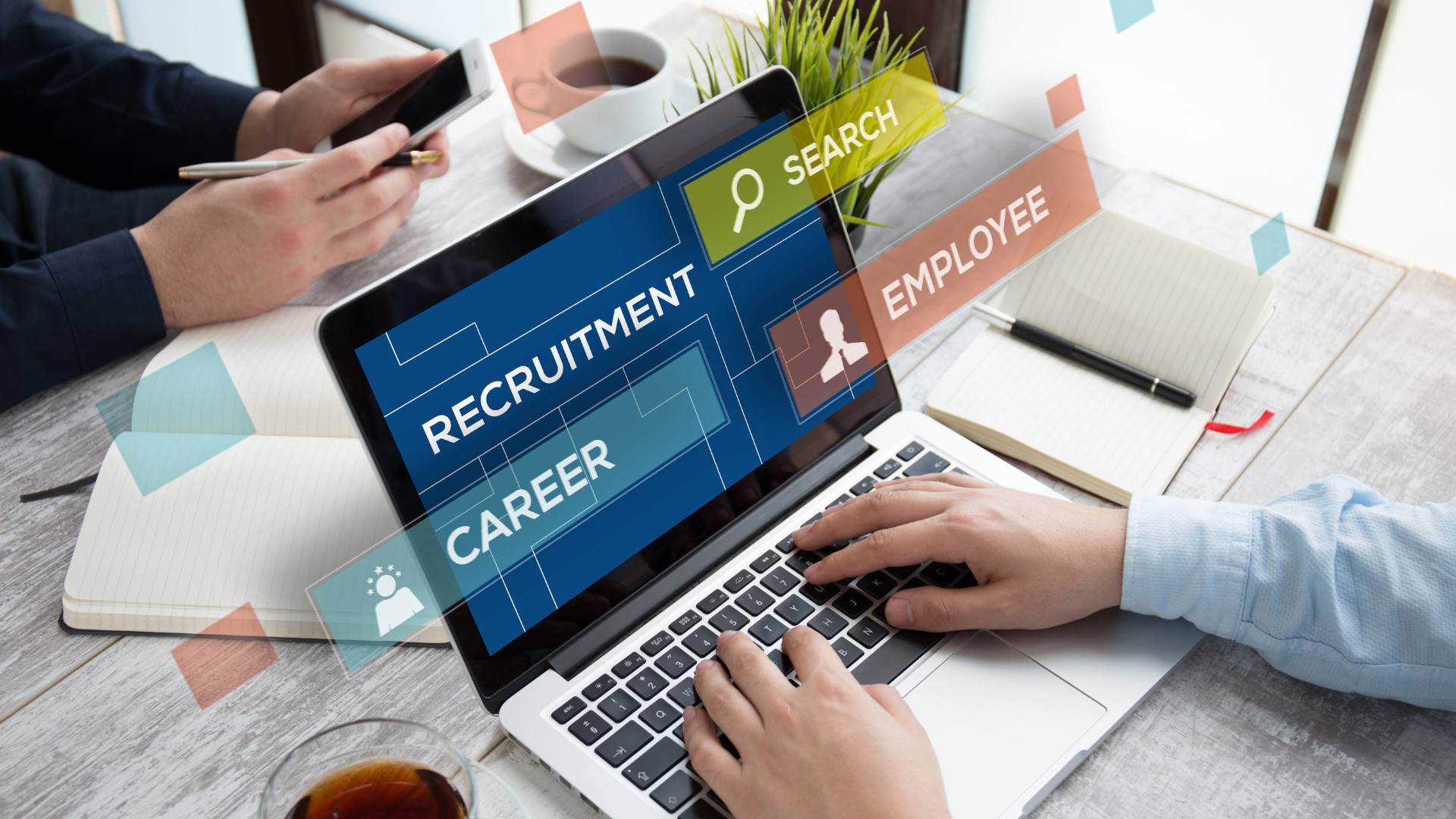 A person types of a laptop, demonstrating recruiting for healthcare positions in Western PA.